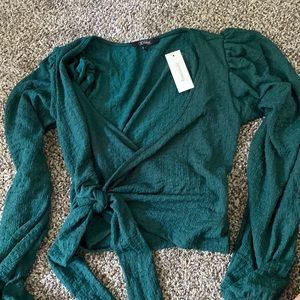 Long sleeved wrap around top
